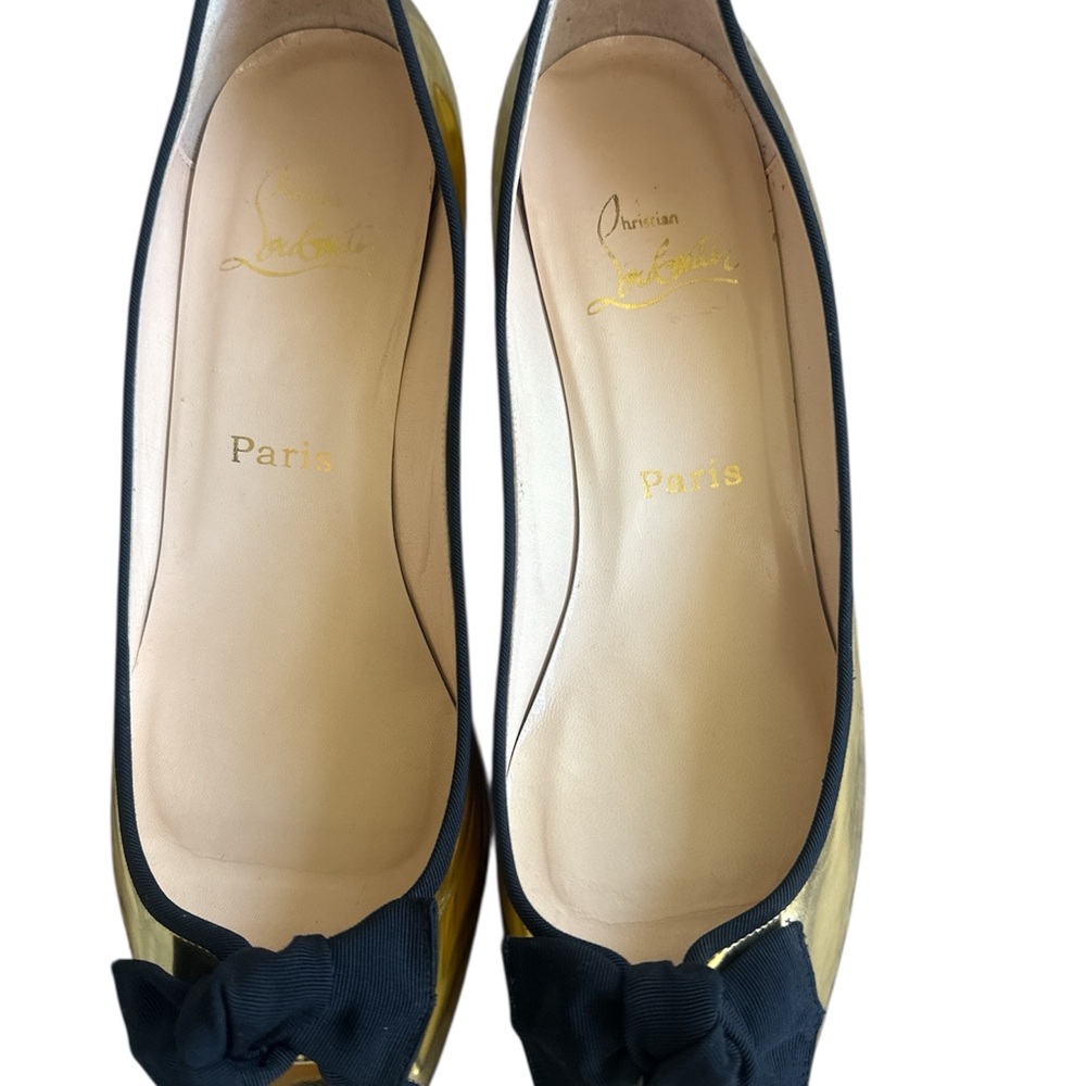 Christian Louboutin Metalic Gold and Black Low Heel with Elegant Silhouette